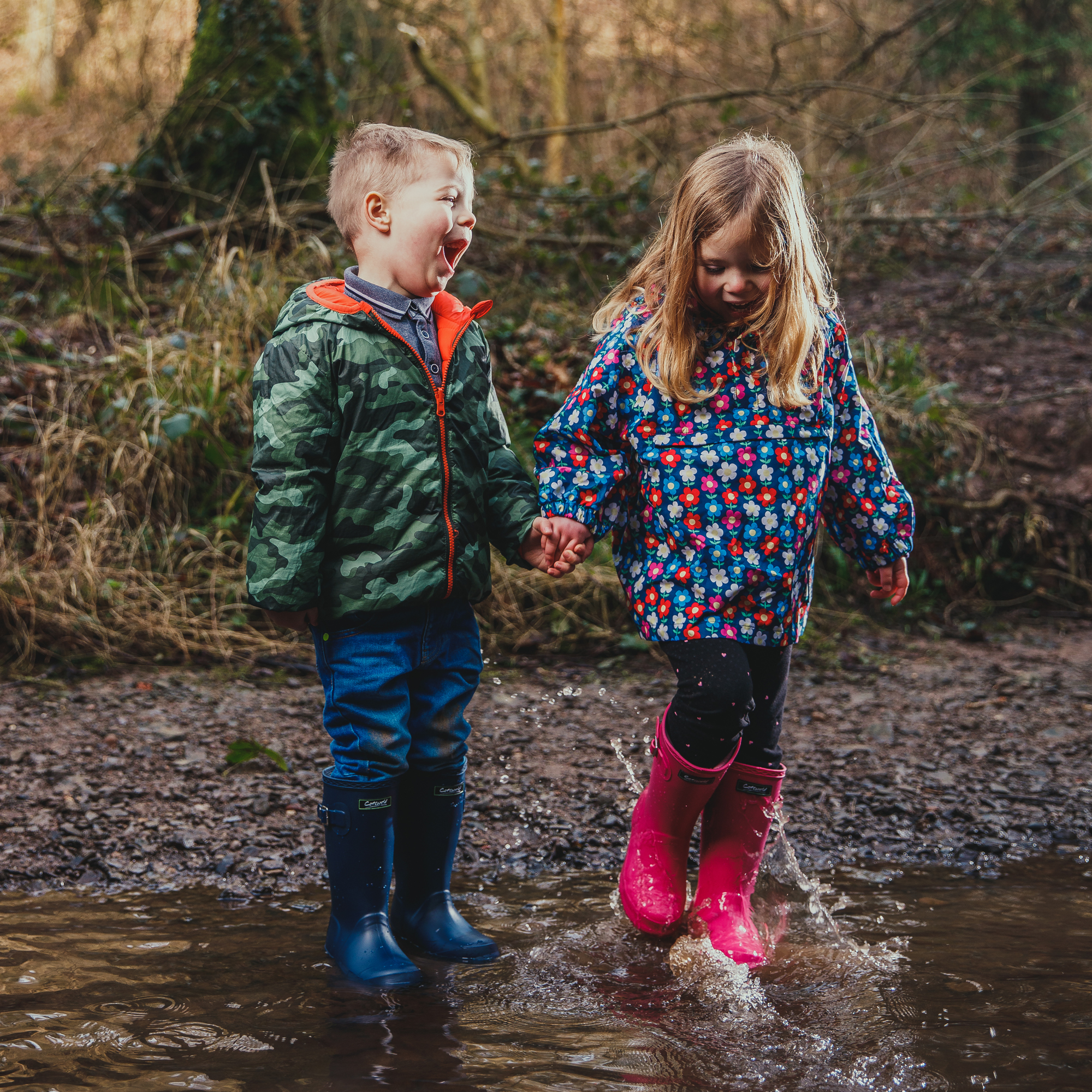Children playing in woodland